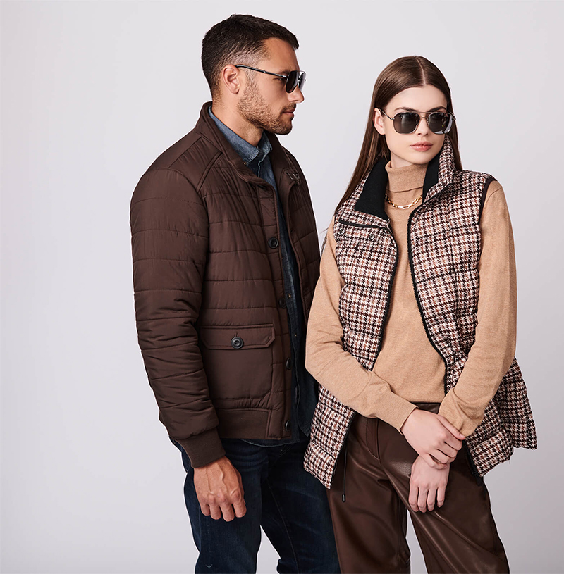 Woman and man in jackets, Bernardo brand